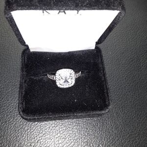 Silver cubic zirconia diamond ring.